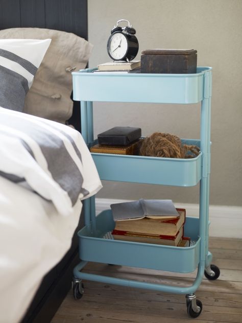 The three-tiered RÅSKOG kitchen cart works as well beside your bed as it does beneath your countertop! Its bins help keep your clock, eyeglasses, and favorite books handy, and  casters let you roll it wherever you need it. Raskog Ikea, Ikea Raskog Cart, Raskog Cart, Ikea Cart, Ikea Raskog, Ikea Finds, Apartment Storage, Kitchen Trolley, Utility Cart