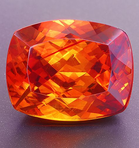 Gem quality sphalerite is a rare collector stone. The mineral is usually nearly black in color but is occaisionally found in transparent pieces of an orange or yellowish brown hue. Clean pieces are extremely rare. More @ www.multicolour.com and #gemstones Sanjana Aesthetic, Orange Gem, Ruby Rings, Faceted Gems, Ruby Pendant, Rare Gems, Mineral Stone, Ruby Earrings, Minerals And Gemstones