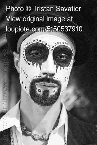 Photo taken at the Dia de los Muertos procession in the Mission (San Francisco) on Nov 2, 2010. For more info on this event, please check out my Dia de los Muertos series.  beard, bindis, day of the dead, face painting, Facepaint, goatee, Halloween, hat, makeup, man, night, people, skull makeup, sugar skull makeup. Beard Halloween Makeup, Man Skull Makeup, Beard Halloween Costumes, Beard Makeup, Halloween Beard, Muertos Makeup, Day Of The Dead Makeup, Beard Costume, Dead Makeup