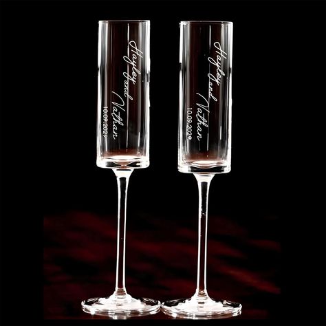 PRICES MAY VARY. Personalized Champagne Flutes - The best unique wedding gift to give a bride and groom. Customized (champagne glasses) wedding gifts hold emotional & sentimental value that cannot be duplicated. Our personalized champagne glasses are permanently laser-engraved and will be cherished for years to come by the married couple Engraved champagne flutes for the couple make a unique gift idea for weddings, anniversaries, bridal showers, engagement parties, housewarming and other special Etched Champagne Flutes Wedding, Etched Champagne Flutes, Wedding Flutes Bride And Groom, Modern Champagne Flutes, Frangipani Wedding, Engraved Champagne Flutes, Champagne Flutes Wedding, Champagne Glasses Wedding, Personalized Champagne Glasses