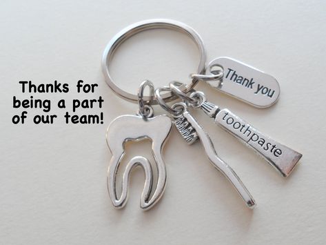 "This listing is for 1 keychain.  These are great gifts for dental assistants and coworkers.   The keychain will come attached to card that says \"Thanks for being a part of our team!\" See my other medical related items here:  https://www.etsy.com/shop/JewelryEveryday?ref=seller-platform-mcnav&search_query=medical Check out my other employee appreciation keychain listings here: https://www.etsy.com/shop/JewelryEveryday/search?search_query=employee&order=date_desc&view_type=gallery&ref=shop_sear Dental Assistant Gifts, Gift Coworker, Assistant Gifts, Toothbrush Toothpaste, Gifts For Dentist, Pinky Promise, Employee Appreciation, Dental Assistant, Keychain Set