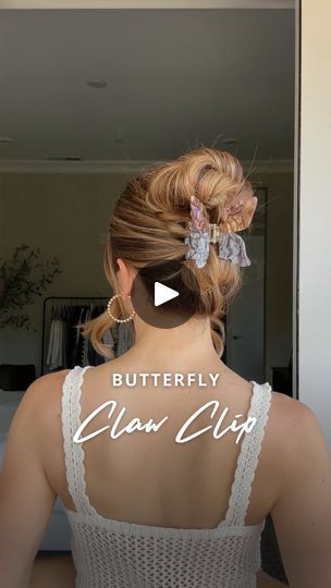 4.7M views · 33K reactions | Butterfly Claw Clip Hairstyle 🦋  Start with your hair in a ponytail. Lift your ponytail straight up and place a butterfly claw clip over the hair tie. Split the ponytail above your head into two and cross them. Bring both sections down. Twist each section toward the clip two times before pushing them under the claw clip to secure. Gather the remaining ends and tuck them under the side of the clip. Gently pull on the top sections of hair to expand and fluff as desired!  #hair #hairtutorial #updo #hairstyles | Nichole Ciotti | nicholeciotti · Original audio Updo With Butterfly Clips, Ponytail Lift, Straight Up Hairstyles, Ponytail Claw Clip, Ponytail Straight, Butterfly Claw Clip, Butterfly Hairstyle, Hair In A Ponytail, Cute Hairstyles Updos