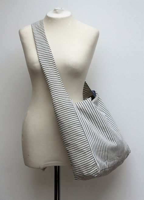 A really lovely, large bag made in French cotton ticking. It can be comfortably worn across the body for every day use. We have also made it with handles for the times when you want to hold it like a tote. Very handy indeed. Each bag has it's own unique lining! Fully lined in cotton shirt fabrics, with two internal pockets. The shirts used to line our bags are from quality shirt makers of Jermyn Street, London. Our fabrics are of the highest quality, making it a very strong, versatile bag for an Sewing Cross Body Bag, Crossbody Tote Bag Pattern, Sew Cross Body Bag, Cross Body Bag Sewing Pattern, Diy Cross Body Bag, Crossbody Bag Sewing Pattern, Big Crossbody Bag, Crossbody Bag Diy, Cross Body Bag Pattern