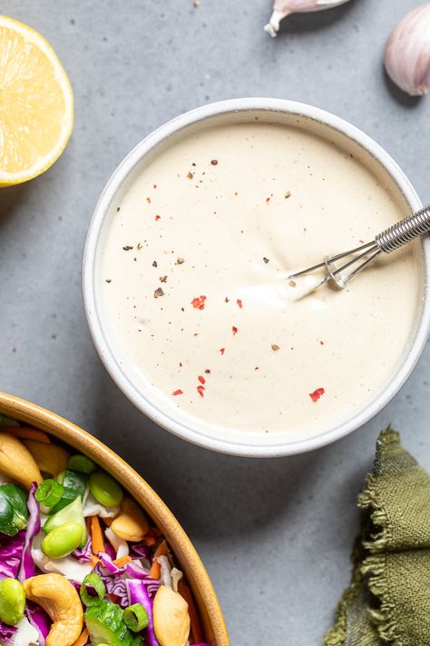 Easy Creamy Tahini Salad Dressing (Oil Free) Over Baked Potatoes, Tahini Salad, Tahini Salad Dressing, Vegan Cajun, Roasted Veggies In Oven, Vegan Salad Dressing, Fourth Of July Food, Oil Free Vegan, Tahini Dressing