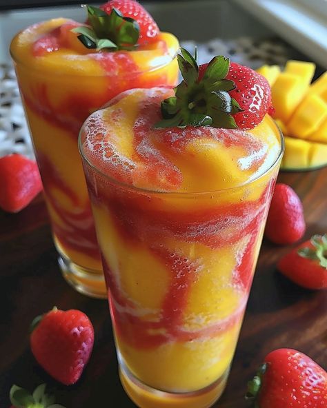 A lovely start to your morning or as a refresher on a hot summer day. Try this Fresh Mango Strawberry Slushie.... https://northeastnosh.com/fresh-mango-strawberry-swirled-slushies/ #northeastnosh #slushie #smoothie #mango #strawberry #mangodrink #strawberrydrink #summerdrink #refresher #food #foodie Avani Recipes, Strawberry Slushie, Comfort Food Chicken, Fresh Orange Juice, Strawberry Drinks, Frozen Mango, Buttered Noodles, Mango Chunks, Chicken Breast Seasoning