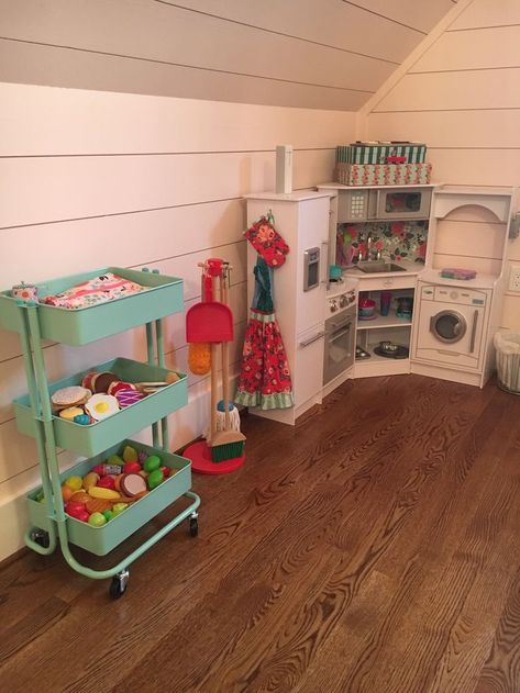 Play Kitchen with play food storage. Kids Kitchen Playroom Toy Storage, Playroom With Play Kitchen, Pretend House Playroom, Organizing Play Kitchen, Play Kitchen Organization Toy Storage, Toddler Play Kitchen Area, Playroom With Kitchen, Toy Food Storage Ideas, Kids Kitchen Storage