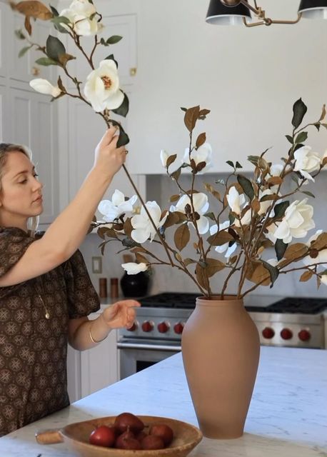 Afloral.com on Instagram: "The 35” Cream Magnolia Fake Flower Branches make styling simple. Bold enough to be styled alone, yet make the perfect neutral focal bloom for your spring centerpieces." Spring Centerpieces, Artificial Magnolia, Arranging Flowers, Magnolia Branch, Dining Room Centerpiece, Brown Vase, Flower Vase Arrangements, Faux Flower Arrangements, Flower Arrangements Simple