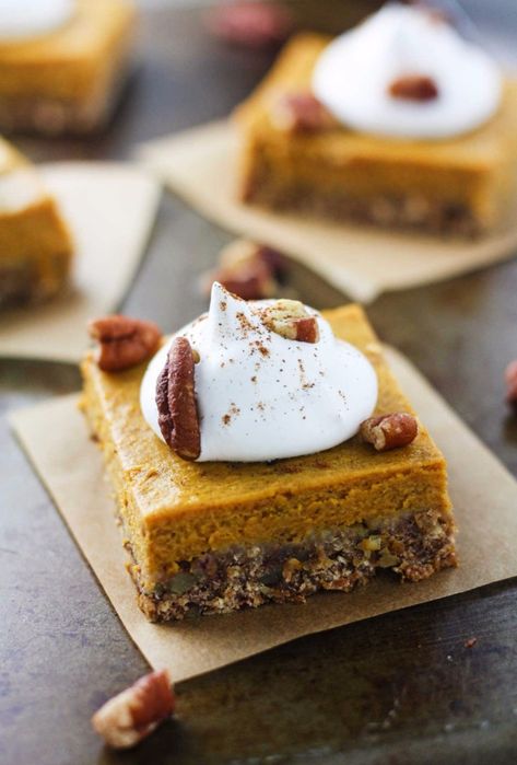 Skinny Pecan Pumpkin Pie Bars - delicious pumpkin bars made with a refined sugar-free pecan crust. Why decide between pumpkin pie and pecan pie when you can have both! www.itscheatdayeveryday.com Healthy Pumpkin Pie Bars, Pecan Pumpkin Pie, Bars Recipes Healthy, Low Calorie Pumpkin, Pumpkin Pie Bars Recipe, Pecan Pumpkin, Pecan Crust, Healthy Pumpkin Pies, Pie Bar Recipes