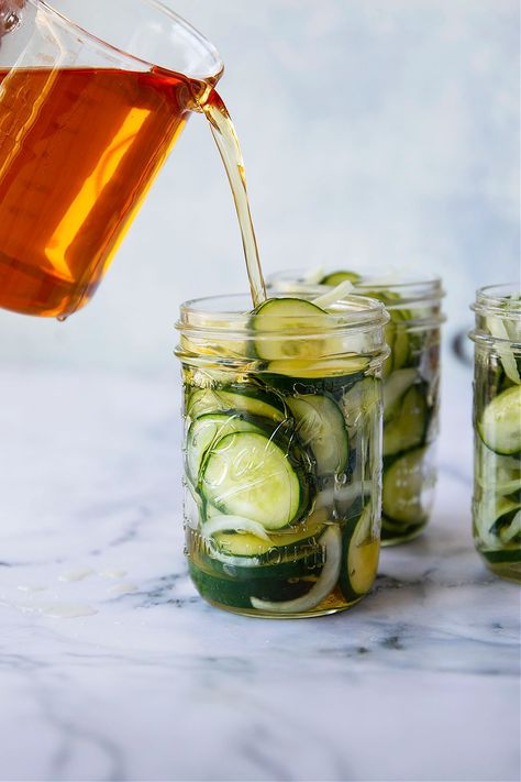 These refrigerator bread and butter pickles are made entirely in the fridge overnight and perfectly crisp, sweet, and tangy. - perfect for using up a bounty of cucumbers! Refrigerator Bread And Butter Pickles, Bread And Butter Pickles, Vinegar Cucumbers, Butter Pickles, Bite Size Food, Cucumbers And Onions, Refrigerator Pickles, Cucumber Plant, Pickle Butter