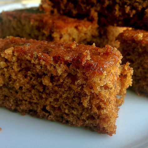 This soft and moist cake is mildly flavoured with cinnamon . The colour of the cake deepens the next day . A very easy recipe to follow . Bonfire Treats, Moist Date Cake Recipe, Bonfire Crafts, Whole Wheat Cake Recipe, Date Cake Recipe, Parkin Recipes, Bonfire Food, Sticky Ginger Cake, Gingerbread Cakes