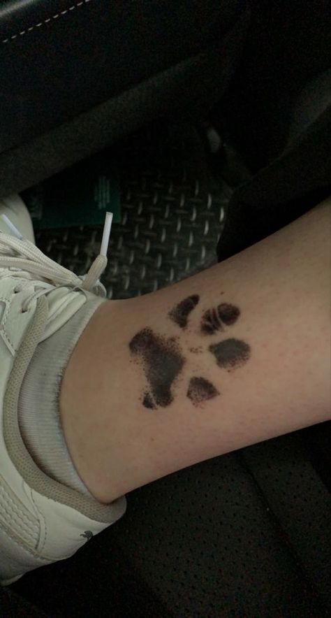 Looking for a way to immortalize your pet's memory? Consider a pet memory tattoo for a lasting tribute. #ImmortalizeMyPet #MemoryTattoo Ankle Tattoo Paw Print, Cat Paw Print Tattoo Ankle, Thigh Dog Tattoo, Paw Ankle Tattoo, Sentimental Cat Tattoos, Late Pet Tattoo, Past Pet Tattoo, Dog Face In Paw Print Tattoo, Passed Animal Tattoos