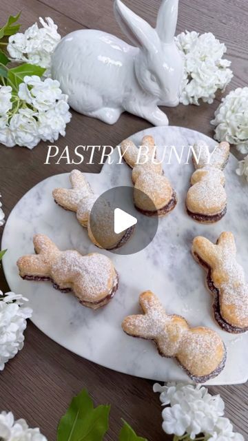 Micah Enriquez on Instagram: "Puff Pastry Bunnies 🤩 How to make them:  Ingredients: • 2 puff pastry sheets thawed to room temperature (I prefer the Pepperidge Farm brand of pastry sheets)  • Nutella (I warm it up for about 30 seconds in the microwave to make it easier to spread) • 1 tbs of melted butter and 1 egg for an egg wash (optional)  • Powdered sugar   1. Preheat oven to 375 degrees  2. Roll out pastry dough and spread the Nutella on the dough  3. Lay another pastry sheet on top  4. Cut bunny shapes with a cookie cuter 5. Brush on the egg/butter wash  6. Cook for about 10-12 minutes or until browned on top but watch it for burnjng. Let cool and then sprinkle on the powdered sugar. Enjoy!   #Easterbunny #puffpastry #nutella #trending #foryou #pastry #easyrecipe #momlife" Easter Pastries, Nutella Puff Pastry, Egg Butter, Puff Pastry Desserts, Easter Lunch, Nutella Cookies, Pepperidge Farm, Chocolate Croissant, Ham Cheese