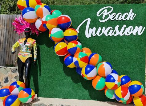 Summer Beach Ball Photostation Backdrop on the beach. Green grass Backdrop with cursive wording and mannequin adorned in a Virgin Islands swimsuit. Beach Ball Backdrop, Beach Ball Arch, Pool Party Table, Green Grass Backdrop, Graduation Dance, Grass Backdrops, Beach Bash, Beach Backdrop, Beach Balls