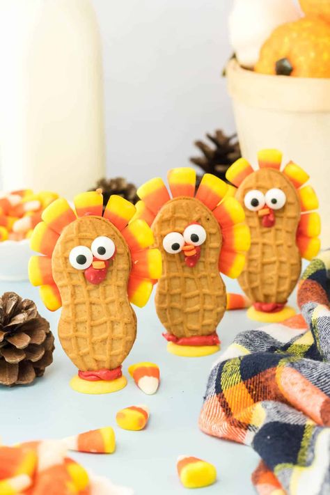 Add a festive touch to your fall and Thanksgiving celebrations with these charming Nutter Butter turkey cookies! Made with everyone's favorite Nutter Butter cookies and colorful candy corn, these adorable treats will bring smiles to both kids and adults. Click the link below to grab the recipe and create a batch of these delightful, gobble-worthy cookies! Thanksgiving Invites, Butter Turkey, Thanksgiving Hosting, Cookies Kids, Thanksgiving Candy, Candy Wafers, Turkey Treats, Thanksgiving Desserts Table, Thanksgiving Foods