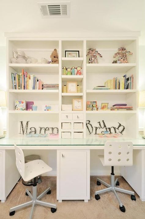 Shared girls' room features a built in white desk boasting a glass top and seating two white rolling desk chairs in front of white shelves accented with personalized name decor. Desk For Girls Room, Homework Room, Shared Girls Room, Girls Room Design, Shared Girls Bedroom, Girl Desk, Study Room Design, Kids' Desk, Bedroom Desk