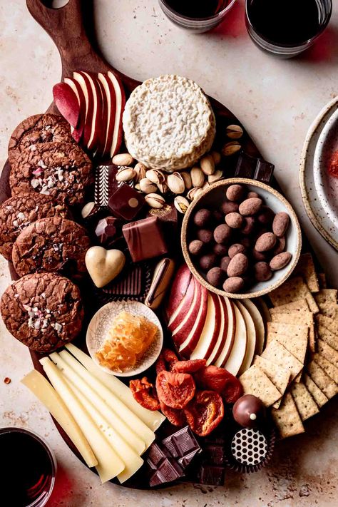 Turn any occasion festive with this cheese and chocolate board loaded with fruit, cheese, nuts, crackers, cookies, and of course ALL THE CHOCOLATE. Perfect for a girl's night, date night, or really any night. Serve up a chocolate dessert board for Valentine's day or any holiday. This easy chocolate charcuterie board is sure to wow. Chocolate Board, Instant Dessert, Homemade Irish Cream, Granola Cookies, Bojon Gourmet, Vegan Truffles, Double Chocolate Cookies, Pear Recipes, Chocolate Cheese