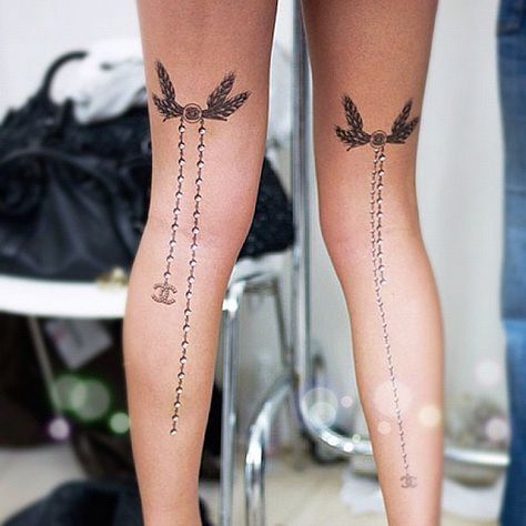 This Chanel inspired tattoo is for serious Chanel fans. Chanel Tattoo, Back Of Leg Tattoos, Best Leg Tattoos, Leg Jewelry, Sparrow Tattoo, Ribbon Tattoos, Muster Tattoos, Leg Tattoos Women, Leg Sleeve Tattoo