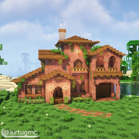 ▛From IG: @airtugmc ▟ Cozy house build! Looks natural and modeled after realistic Mediterranean-style mansions! Check out for more amazing designs on their instagram. Minecraft Brick Mansion, Terracotta Minecraft House, House Builds Minecraft, Minecraft Village Ideas Buildings, Minecraft Jungle House, House Ideas Minecraft, Minecraft Brick, Modern House Minecraft, Minecraft House Ideas