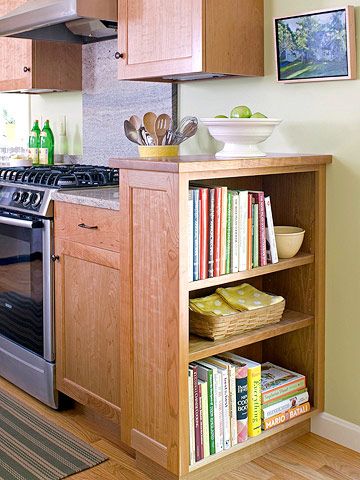 Open-Shelf Storage Solution - Boost storage and display space in a kitchen by capping off a run of cabinets with open shelves. These shelves face the adjoining breakfast room and offer a convenient spot for storing cookbooks. The shelf unit also rises slightly above the counter surface to help hide clutter. Storing Cookbooks, House Schemes, Kitchen Bookcase, Hide Clutter, Kitchen Bookshelf, Cookbook Storage, Redecorating Ideas, Corner Kitchen Cabinet, Cabinets Ideas