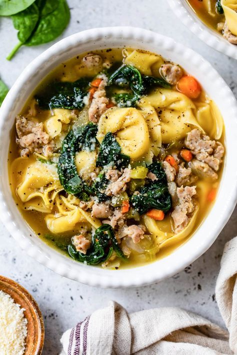 This easy Sausage Tortellini Soup is a cozy one-pot meal that comes together quickly, making it ideal for busy weeknights. It’s a complete, satisfying dinner that the whole family will love. #onepot #soup #tortellini #sausage #dinner #highprotein Spinach And Tortellini Soup, Spinach And Tortellini, Sausage Tortellini Soup, Pizza Soup, Med Diet, Sausage Tortellini, Italian Sausage Pasta, Healthy Soups, Tortellini Pasta