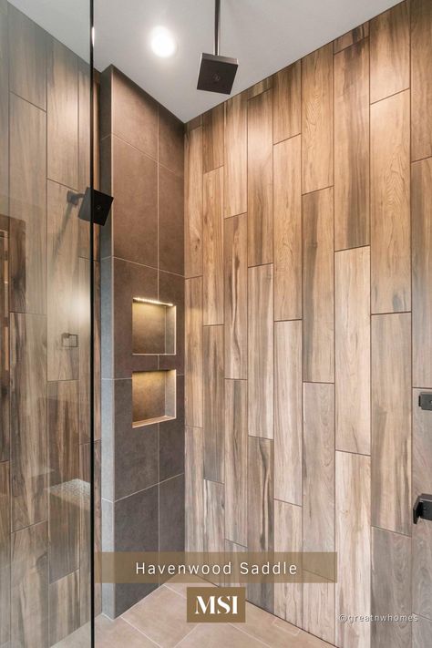 Create a dream shower with wood-look porcelain tile. Havenwood Saddle Wood features warm golden brown grain and chocolate knots that compliments every design stile without the maitenance or fuss of other materials! Shower Tile Ideas Wood Look, Brown Shower, Wood Looking Shower Tile, Shower With Wood Look Tile, Wood Looking Tile Shower Ideas, Vertical Wood Tile Shower Ideas, Wood Shower Tile, Wood Look Shower Tile, Wooden Tiles Shower Wall