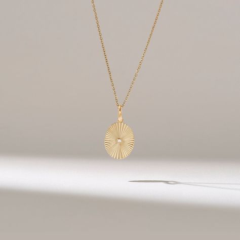 Minimalist Real Gold Pendant Necklaces for Birthday Gifts Features * Made to Order. * Gold KT: 14KT * Custom Gold Color: Yellow Gold * Charm 9.70mm x 11.17mm * Charm Thickness: 1.15mm * Diamond Color-Clarity: D-E-F color VVS clarity (excellent ideal cut) * Total Ctw: 0.03 ctw * Ready to Ship in 5-7 Business Days ✓ We care about the environment,the jewelry we cast is made with recycled gold. We source exclusively post-consumer material that is refined back to their pure elements to ensure that th Minimalist Diamond Necklace, Diamond Necklace Gold, Necklace Womens, Pendant Ring, Sun Pendant, Necklace Minimalist, Necklace Women, Recycled Gold, Diamond Fashion