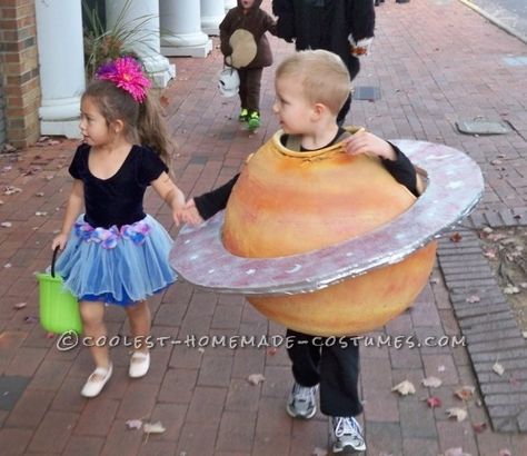 Great Saturn Boy Homemade Halloween Costume Diy Saturn Costume, Saturn Halloween Costume, Mars Costume Planet, Planet Costume Diy, Planet Costume For Kids, Planet Halloween Costume, Saturn Costume, Planet Costume, Space Party Costumes