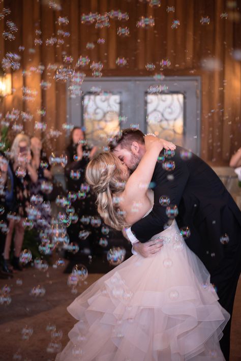 | wedding send off with bubbles | wedding reception exit with bubbles | clean wedding send off ideas | non-sparkler wedding exit ideas | DIY wedding ideas | fun wedding ideas | bubble wedding send off | bubble wedding exit | dfw wedding | photo taken at THE SPRINGS Event Venue. follow this pin to our website for more information, or to book your free tour! SPRINGS location: Westwood Hall in Weatherford, TX photographer:  Kate & Co Photography #weddingideas #weddingphotos #weddingphotography #dfw Wedding Exit Bubbles At Night, Sparkler Exit Wedding, Maryland Wedding Venues, Wedding Bubbles, Wedding Send Off, Wedding Exits, Wedding Lanterns, Dfw Wedding, Wedding Sparklers