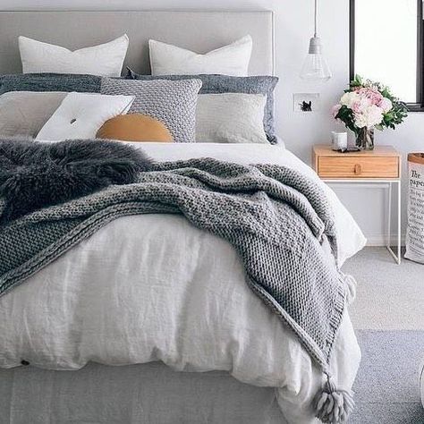 Cosy warm greys with pops of colour - the most relaxing and stylish bedroom combination! Blue Bedroom Minimalist, Styling Beds, Grey Bedhead, Pale Blue Bedroom, Interior Design Styles Quiz, Gray Bedding, Bedroom Styling, Scandi Chic, Bedroom Minimalist