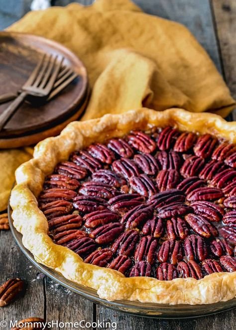 This uber-delicious Easy Eggless Pecan Pie is a MUST-MAKE for the holidays! With its crispy top, gooey center, and flaky crust, this Thanksgiving classic dessert will wow you and your guests. Easy to make, easier to eat. @mommyhomecookin #recipe #eggfree #eggless #egglessbaking #eggallergy #pecan #pie #dessert #holidays #dessert Eggless Pecan Pie, Eggless Pie, Egg Free Dessert Recipes, Egg Free Desserts, Eggless Desserts, Eggless Recipes, Chocolate Pecan Pie, Eggless Baking, Pecan Pie Recipe