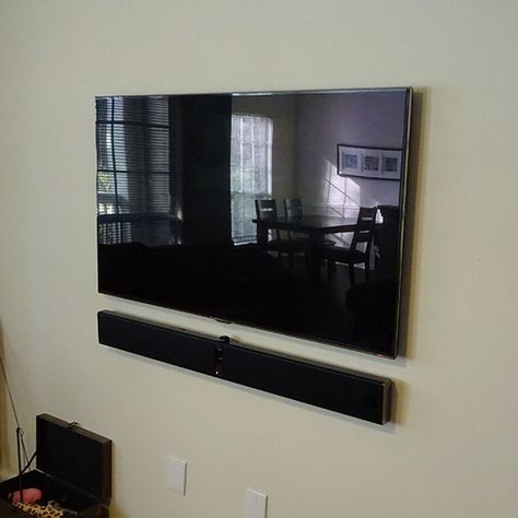 Tv And Sound Bar Mounted, Tv With Sound Bar On Wall, Tv Sound Bar Ideas, Sound Bar Mounting Ideas, Tv Sound Bar, House Interior Design Living Room, Hanging Tv On Wall, Sound Bar Mount, Wall Entertainment Center