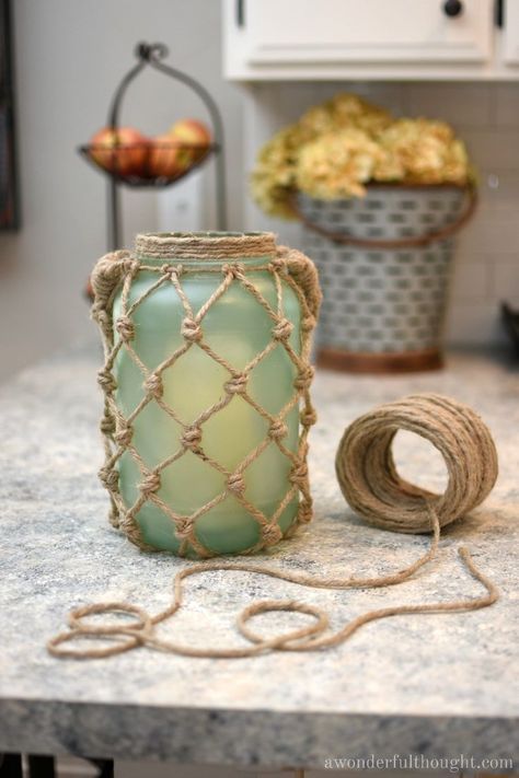 DIY Sea Glass Rope Lantern. Perfect for your beach/coastal decor | awonderfulthought.com Diy Rope Design, Rope Lantern, Diy Summer Crafts, Rope Diy, Rope Crafts Diy, Diy Lanterns, Mason Jar Crafts Diy, Rope Crafts, Jar Diy