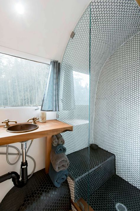 Photo 35 of 46 in 26 Vintage Airstream Renovations That’ll Make You Want to Hop on the Bandwagon - Dwell Rv Bathrooms, Airstream Bathroom, Airstream Living, Airstream Travel Trailers, Airstream Remodel, Airstream Interior, Airstream Renovation, Mobile Home Living, Hexagon Mosaic Tile