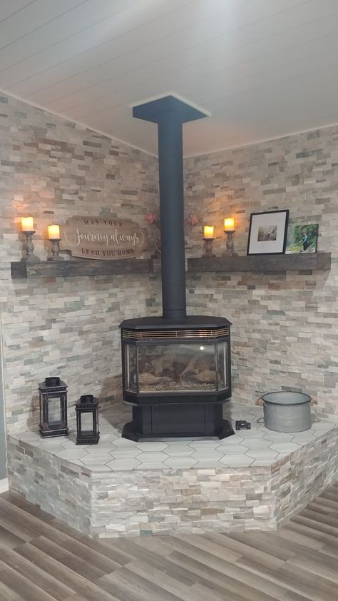 Wood Burning Stove Remodel, Tile Around Pellet Stove, Gas Stove Living Room, Stone Around Woodstove, Brick Wall Behind Wood Stove, Freestanding Wood Stove Hearth Ideas, Wood Stove Stone Wall, Woodstoves In Living Rooms, Corner Fireplace Wall Ideas