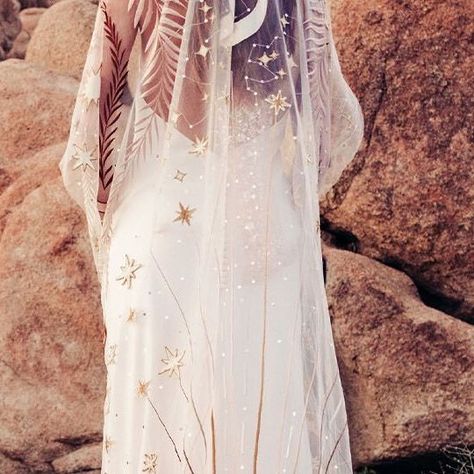 Rue De Seine Wedding Dresses on Instagram: "INTRODUCING: The Desert Rose Veil 🌙✨ Desert dreams & bridal elegance has combined to create this magical new veil design. Featuring a constellation of lusterously embroidered stars, delicate wrap-around foliage and glimmering sequins that cast shimmers with your every step - to create a truly unforgettable and hypnotic entrance on your wedding day. Does this bridal look speak to you? Let us know in the comments 💫 #DesertRoseVeil #RueDeSeine #RueDeSe Pegasus Constellation, Constellation Embroidery, Rose Veil, Dramatic Veil, Rue De Seine Wedding Dress, Celestial Wedding, Constellation Print, Bridal Elegance, Bridal Cape