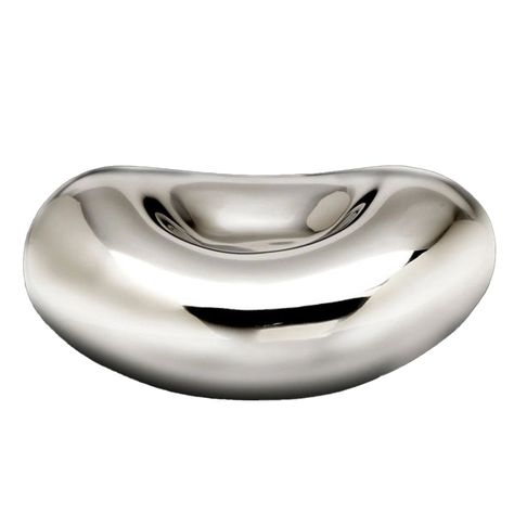 This cool bean-shaped sculptural bowl feels good in the hand and adds a modern pop to any table or shelf. Handcrafted of food-safe polished aluminum. Larger version also available. Bean Bowl, Winter Chalet, Mouth Freshener, Girl Apartment, Ring Bowl, Silver Bowl, Neon Party, Museum Of Contemporary Art, Aesthetic Bedroom