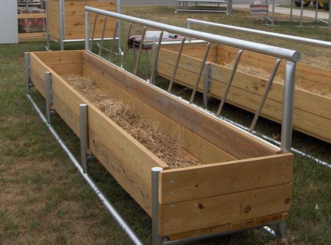 Combination hay and feed fence line bunk feeder is designed to hold hay and feed. The stanchion bars are welded 14″ apart to limit head movement, thus saving hay. The main frame is welded into a solid unit from heavy wall 2 1/2″ O.D. steel pipe along with 2″ x 8″ grade #1 treated lumber bolted on. The feeder measures 50″ from the ground to the top. Measures 25″ to the top of the side board.  Available in: 8′ / 12′ / 16′ lengths x 35″ wide x 16″ deep.