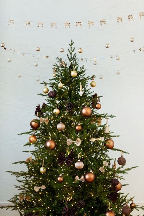 How To Put Lights On Your Christmas Tree For Maximum Twinkle Xmas Ornaments Diy, Copper Christmas Decor, Christmas Tree Game, Best Christmas Tree Decorations, Best Artificial Christmas Trees, Christmas Quiz, Copper Christmas, Front Door Wreaths, Amazon Christmas