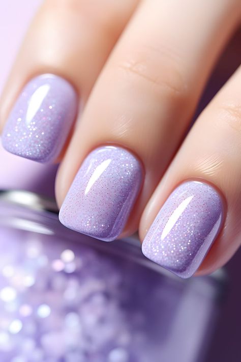 pastel nails, lavender nails, glittery nails, nail design, nail art, nail inspiration, beautiful nails, trendy nails, holiday season nails, sparkling nails, festive nails, new year's nails, seasonal nails, stylish nails, nail trends, nail beauty, nail aesthetics, nail decor, nail glam, nail sparkle, nail goals, nail love, nail vibes, nail shades, nail colors, nail magic Nail Sparkle, Glitter Nail Ideas, Nails Lavender, Sparkling Nails, Nail Aesthetics, Nails Sparkling, Nails Festive, Nail Vibes, Purple Glitter Nails