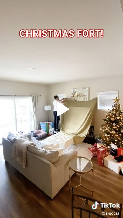 home living room fort during the holidays. Video on tiktok Couch Fort Ideas Living Rooms, Fort Ideas Indoor Living Rooms, Pillow Fort For Adults, Sheet Fort Indoor, Fort In Living Room, Sheet Fort, Christmas Fort Ideas, Cute Fort Ideas, Fort Living Room