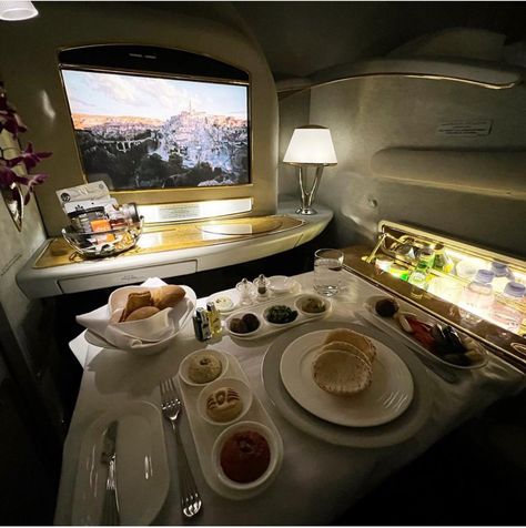 Sit back , relax in ultimate comfort and enjoy the traditional Emirates Arabic Mezze when flying Emirates first class! ------------------------------ #food #feedingfamily #moderncatering #foodpics #foodart #darkfoodcanvas #foodpic #flightattendantuniform #food_photo #foodies #eeeat Fly First Class Aesthetic, First Class Singapore Airlines, Emirates Flight Aesthetic, Flying First Class Aesthetic, Airplane First Class Aesthetic, First Class Flight Emirates, First Class Flight Luxury, Emirates First Class Luxury, Airplane Emirates