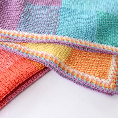 Tunisian Sunset blanket | Poppy & Bliss Modern Haken, Crocheted Blankets, Tunisian Crochet Pattern, Crochet Border, Simple Stitch, Tunisian Crochet Patterns, Tunisian Crochet Stitches, Linen Stitch, Other Languages