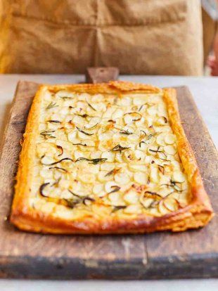 Soft, buttery Jersey Royal potatoes, sweet onions and the fruity tang of taleggio cheese combine in a glorious topping for this quick and easy savoury tart. Pie Pastry Recipe, Taleggio Cheese, Vegetarian Roast, Steak And Ale, Jamie Oliver Recipes, Savory Tart, Tasty Vegetarian Recipes, Tart Recipes, Spring Recipes