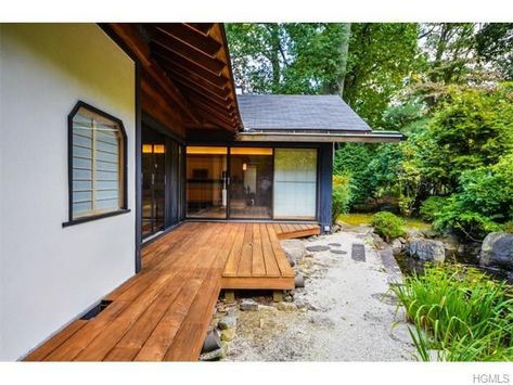 A Serene Japanese-Style Retreat in Suburban New York | realtor.com® Japanese Porch, Japanese Deck, Portico Entry, Japanese Exterior, Japan House Design, Japanese Inspired Garden, Japanese Inspired Home, Japanese House Design, Japanese Garden Landscape