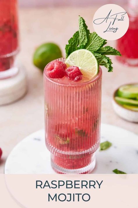 Cool off and sip on something sweet with this delicious Raspberry Mojito recipe! Made with fresh mint, fresh lime juice, juicy raspberries, and a splash of rum, this refreshing drink is perfect for any occasion! Raspberry Lime Mojito, La Croix Recipes, Raspberry Drink Recipes, Raspberry Mojito Recipe, Rasberry Lemonade, Mojito Pitcher, Xmas Drinks, Mojito Drink, Mint Drink