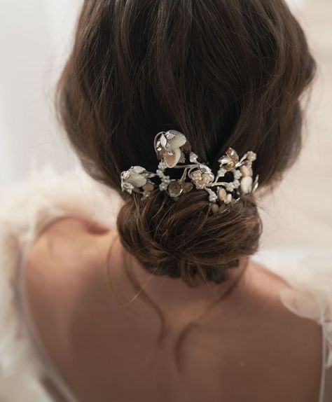 @meheadpieces posted to Instagram: Have you met our Evelyn comb? Mother of pearl leaves and flowers predominate this comb that wears best over a low bun. Shop Maria Elena combs in the link in bio. #pearl #motherofpearl #swarovskicrystal #swarovski #flowers #hairaccessory #bridalhairstyle #bridalheadpiece #weddingheadpiece #weddinghairstyle #bridalinspo #weddinginspo #bridalaccessories #weddingaccessories Swarovski Flowers, Maria Elena, Low Bun, Bridal Inspo, Bridal Headpieces, Hair Comb, Bridal Accessories, Bridal Style, Wedding Inspo