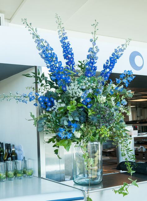 Bar Arrangement, Blue Flower Arrangements, Wildflower Wedding Theme, Pantone Colour Of The Year, Hydrangea Vase, Glass Bottle Vase, Elegant Wedding Flowers, Delphinium Flowers, Large Flower Arrangements