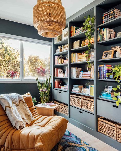 Painted bookshelf in home library. Living Rooms With Bookshelves, Billy Bookcase Reading Nook, Home Library Billy Bookcase, Bookshelf Wall With Ladder, Ikea Library Ideas Billy Bookcase Hack, Bookshelf Around Door, Built In Corner Shelves Living Room, Ikea Library Ideas, Library Shelves Design