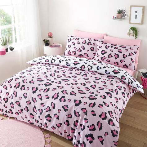 * Made from recycled polycotton * Reversible design * Includes 2 x duvet covers * Includes pillowcase(s) * Machine washable * 144 thread count * Secure closure Supplied in a pack of 2, these duvet covers and pillowcases have been crafted from a blend of recycled polycotton in a 144 thread count for a fabulous night sleep. One bedding set has been designed in a pink colourway with pink and purple leopard prints, and the other has been designed with an Aztec leopard print, both of which are printe Pink And Leopard Bedroom, Pink Leopard Print Wallpaper Bedroom, Leopard Sheets, Leopard Print Bedroom, Leopard Room, Leopard Bed Sheets, Animal Print Bedroom, Leopard Bedding, Animal Print Bedding Kids