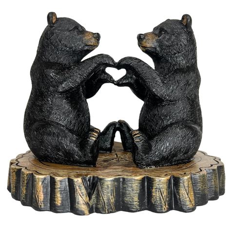 PRICES MAY VARY. CHARMING DESIGN - Features two black bears sitting face-to-face, crafting a heart with their paws, symbolizing love and unity. EXPERT CRAFTSMANSHIP - Sculpted from high-quality resin, ensuring durability and remarkable detail that captures the essence of the whimsical scene. PERFECT SIZE - Measures 6 inches in width, 4 5/8 inches in height, and 4 inches in depth, ideal for display on shelves, desks, or mantels. FURNITURE FRIENDLY - Includes soft pads on the bottom to protect del Lodge Office, Bears Sitting, Alaska Cabin, Bear Couple, Bear Cabin, Bear Sculptures, Black Bears, Cabin Lodge, Bear Decor